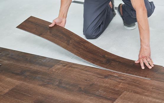 Professional installing vinyl floor