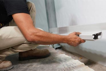 Basement Gutter interior drainage system scaled